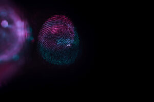 Colored fingerprint against black background