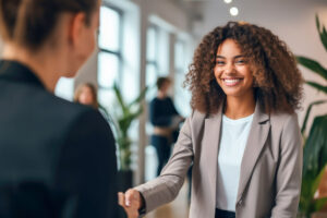 New hire shaking manager's hand on first day